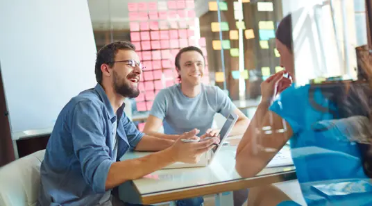 Meeting discussion through glass with reflection