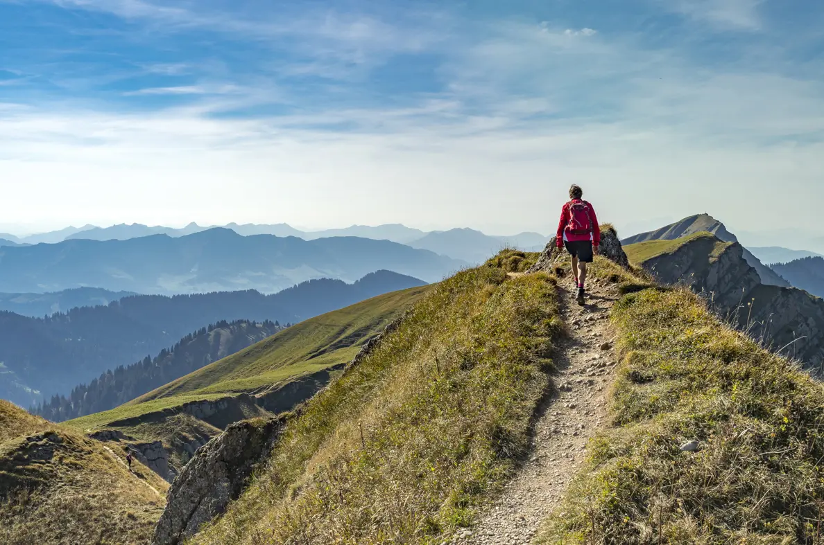 Person walking along the top of a mountain. Amazing views