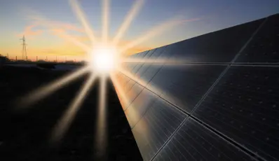 Solar panels with Sun shining